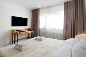 1 dormitorio, tabla de planchar con plancha, wifi gratis y ropa de cama