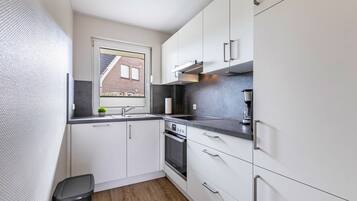 Refrigerador, horno, parrilla de estufa y lavavajillas