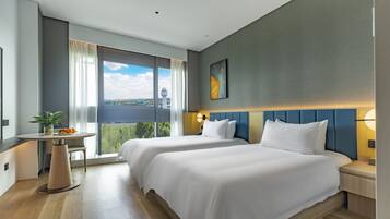 Premium bedding, minibar, desk, laptop workspace