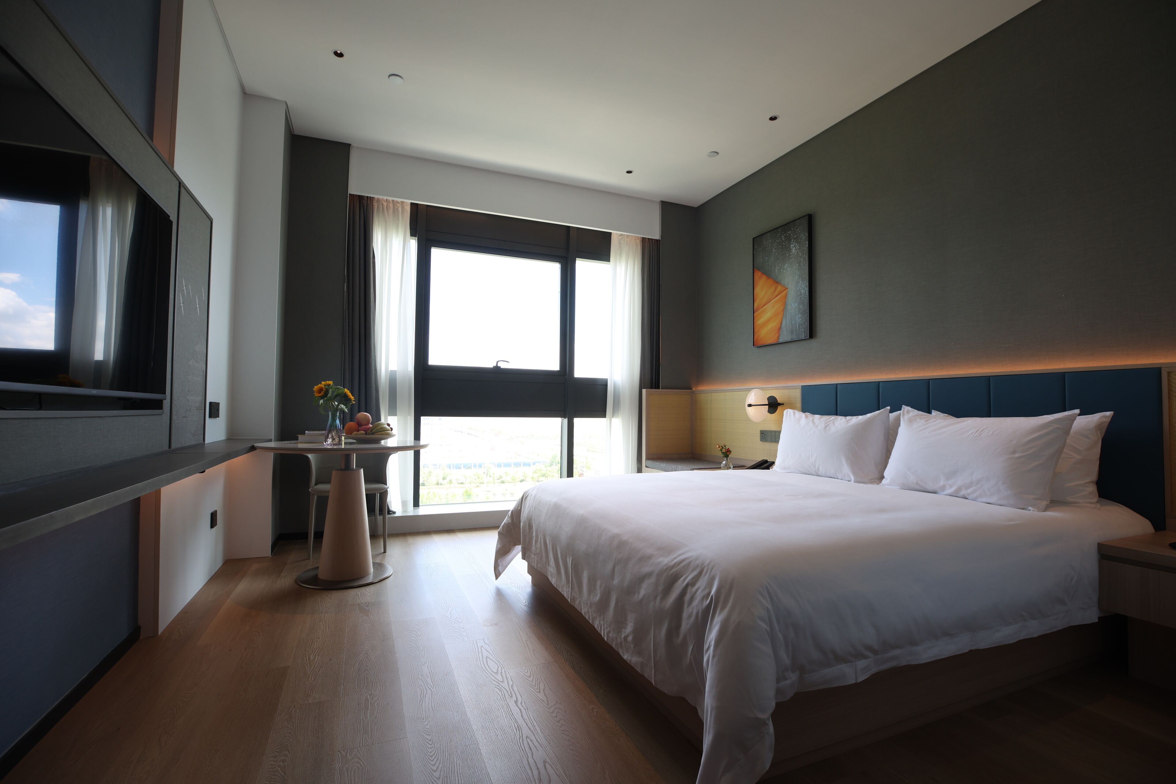 premium bedding, minibar, desk, laptop workspace