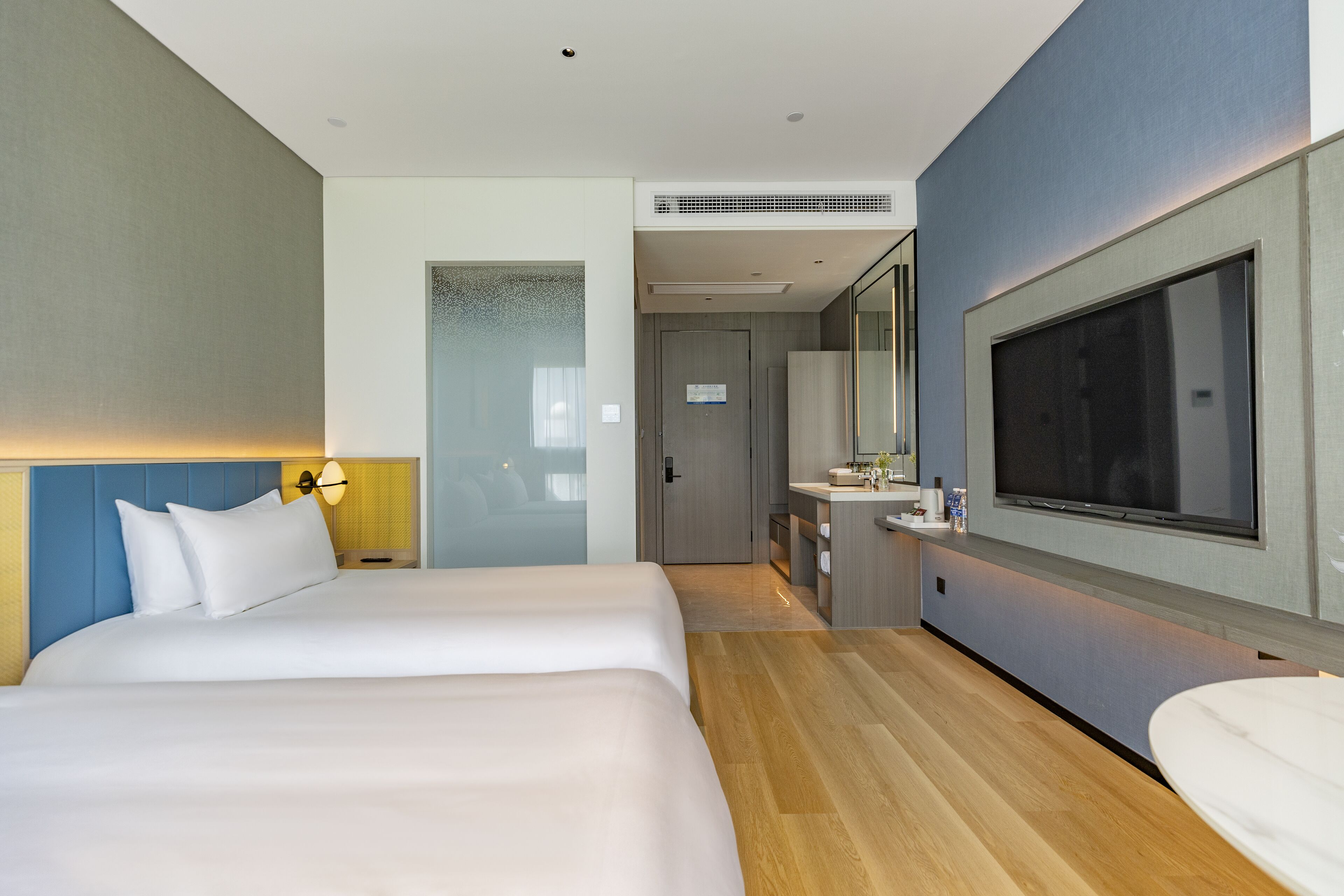 premium bedding, minibar, desk, laptop workspace