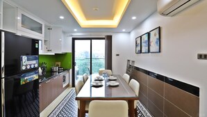 Deluxe Apartment | Private kitchen | Fridge, microwave, stovetop, rice cooker - Paradise Home Xuan La (Hanoi)