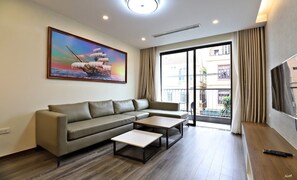Appartement Deluxe | Aire de séjour | Téléviseur connecté de 43 po avec télévision numérique, téléviseur
