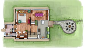 Plano de planta de una casa con sala de estar, comedor, cocina y un patio con una chimenea de piedra.