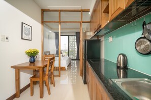 Deluxe-Studiosuite, Stadtblick | Allergikerbettwaren, Pillowtop-Betten, individuell eingerichtet