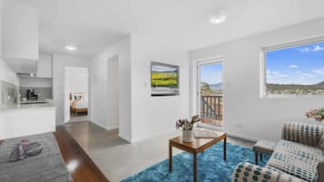 Standard Apartment | Living area | 50-inch Smart TV with digital channels, TV