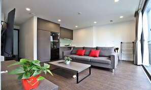 Deluxe Apartment | Living area | 43-inch Smart TV with digital channels, TV
