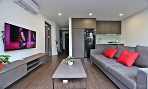 Deluxe Apartment | Living area | 43-inch Smart TV with digital channels, TV