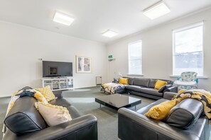 Standard House | Living area | 70-inch TV with digital channels - 4 Bedroom House - Hobart CBD - Parking (Hobart)