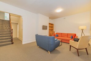 Standard House | Living area | 70-inch TV with digital channels - 4 Bedroom House - Hobart CBD - Parking (Hobart)