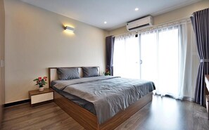 Departamento Deluxe | Cocina privada | Refrigerador, microondas, parrilla de estufa y arrocera 