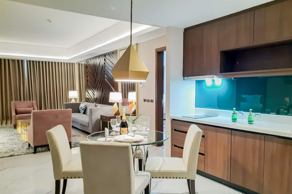 Two Bedroom Suite | Living area | 49-inch LED TV with cable channels, TV