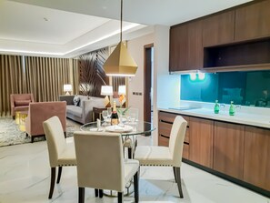 Two Bedroom Suite | Living area | 49-inch LED TV with cable channels, TV - The Excelsior Hotel (Las Pinas)