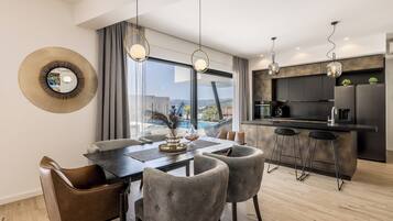 Villa | Living room | 120-cm Smart TV with cable channels, DVD player