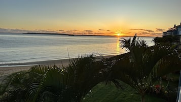 Na praia, toalhas de praia