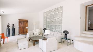 Deluxe Villa | Living area | 70-cm LED TV with satellite channels, TV