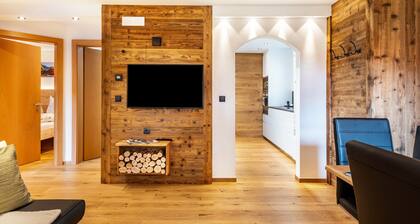 Holiday Apartment "Wegscheiderhof Gartenwohnung" with Mountain View, Private Sauna & Wi-Fi
