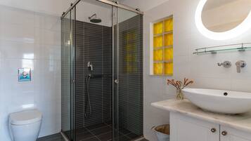 Shower, free toiletries, hair dryer, towels
