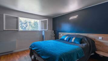 2 dormitorios, tabla de planchar con plancha, wifi gratis y ropa de cama