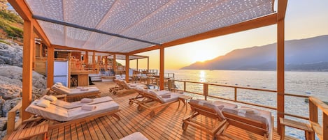 Sun loungers, beach towels, kayaking