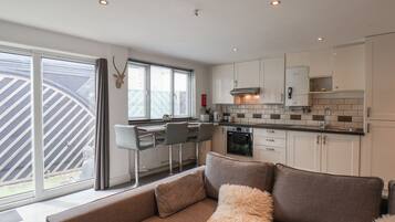 Fridge, electric kettle, toaster, cookware/dishes/utensils