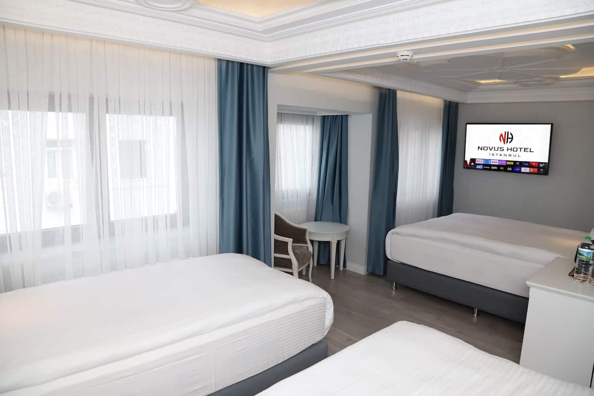 Chambre Quadruple Deluxe | 2 chambres, literie de qualité supérieure, matelas Tempur-Pedic