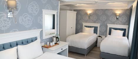 Kamar Quadruple Deluks | 2 kamar tidur, seprai premium, tempat tidur Tempur-Pendic, dan brankas