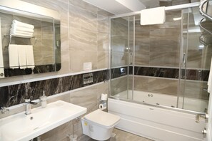 Deluxe Suite | Bathroom | Hair dryer, slippers, towels, soap - Novus Hotel (Istanbul)