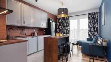 Departamento, 2 habitaciones, balcón | Área de sala de estar