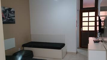 Apartamento família | Escrivaninha, Wi-Fi de cortesia