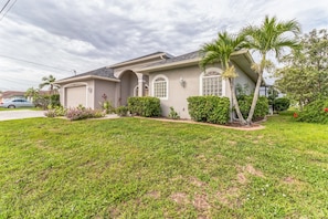 House, 3 Bedrooms | Exterior - Blue Oasis 3 Bedroom Home by RedAwning (Cape Coral)