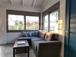 Superior Apartment, 1 Queen Bed with Sofa bed, Sea View, Mountainside | Living area | Smart TV, Netflix, streaming services