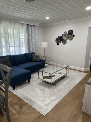 Living area - The Happy House, a quaint, fully remodeled home. (Sebring)