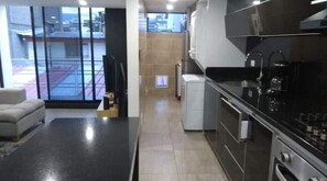 Fridge, microwave, stovetop, coffee/tea maker