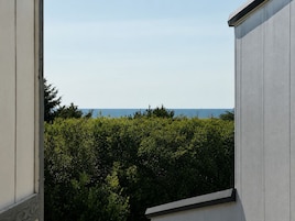 Room, 1 King Bed with Sofa bed, Mobility Accessible, Partial Ocean View | Beach/ocean view