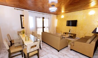 Family Apartment, 2 Bedrooms | Living area | Flat-screen TV