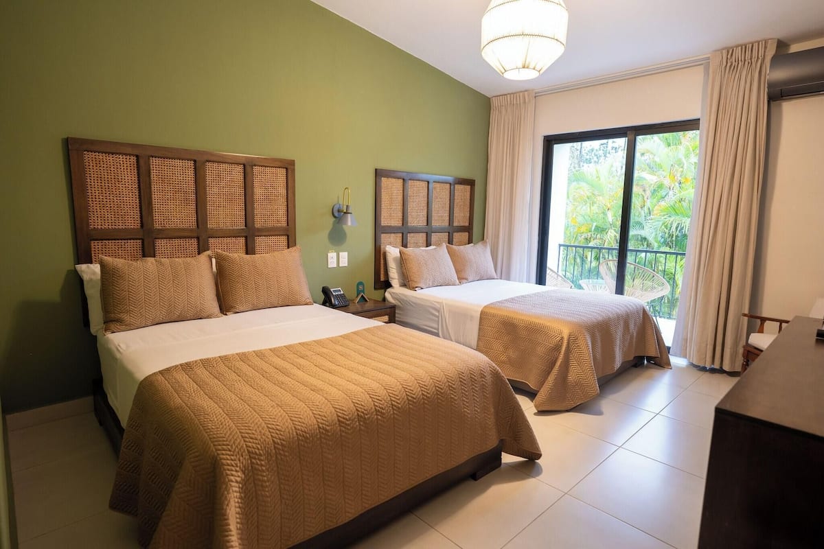 Premium bedding, down duvets, pillow-top beds, in-room safe