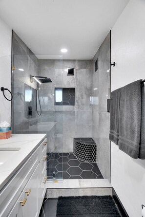 Shower, hair dryer, towels, soap
