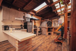 Cottage Panoramique, plusieurs lits, bain à remous, vue montagne | Cuisine privée