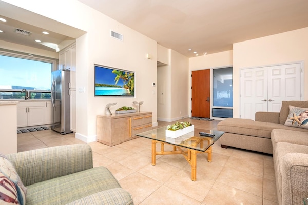 Condo (2 Bedrooms) | Living room | 50-inch flat-screen TV with satellite channels, TV