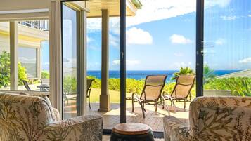 Condo (1 Bedroom) | Living room | 50-inch flat-screen TV with satellite channels, TV