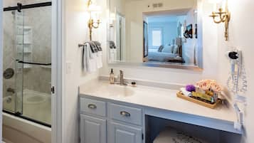 Hair dryer, towels, soap, shampoo