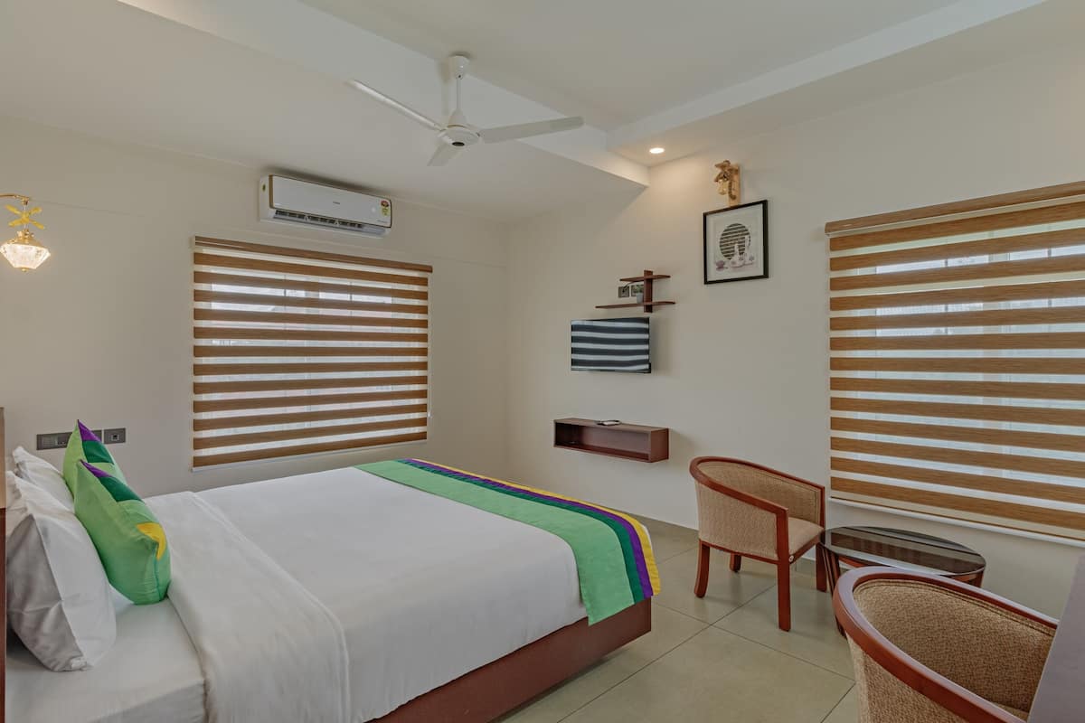 deluxe double room | desk, iron/ironing board