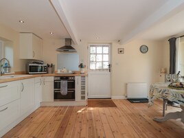 Fridge, electric kettle, toaster, cookware/dishes/utensils