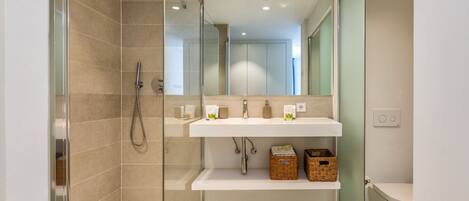 Shower, hair dryer, towels, soap