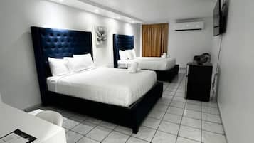 Habitación doble familiar de uso individual | Edredón y ropa de cama