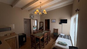Deluxe Cabin | Living area | 100-cm TV with satellite channels