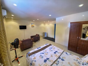 Desk, laptop workspace, free WiFi, bed sheets