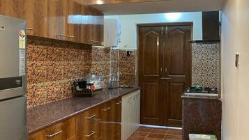 Fridge, stovetop, cookware/dishes/utensils