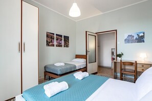 1 bedroom, desk, iron/ironing board, travel crib
